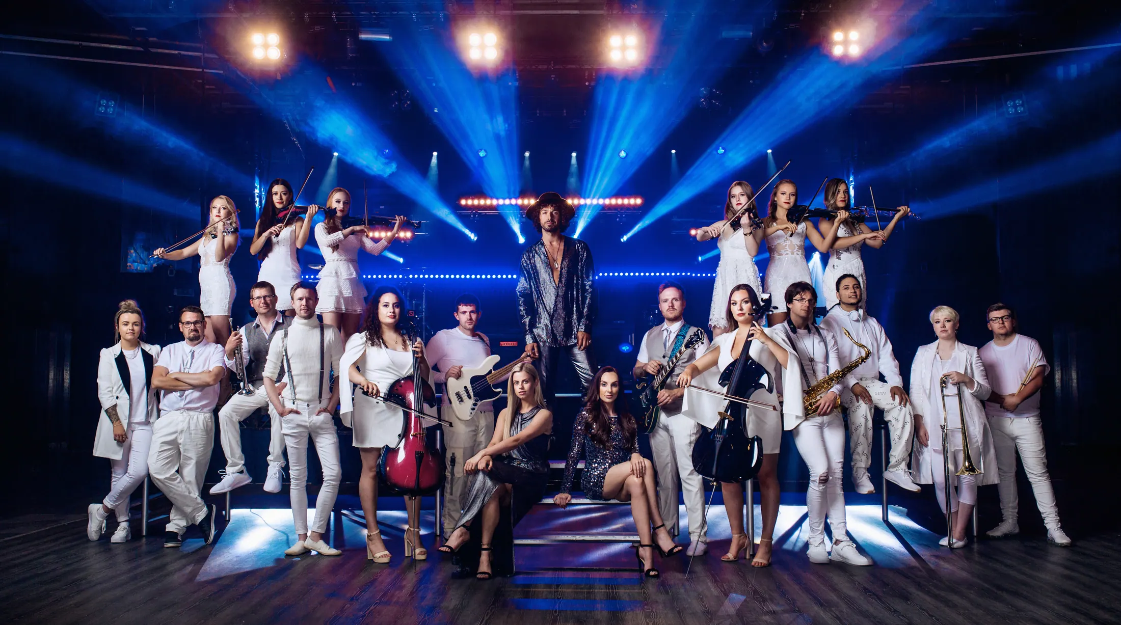 The full In Symphony cast and orchestra on stage